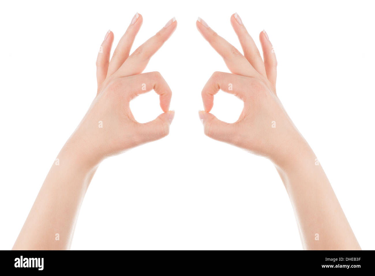 Donna di mani formare la maschera gesto su uno sfondo bianco. Foto Stock