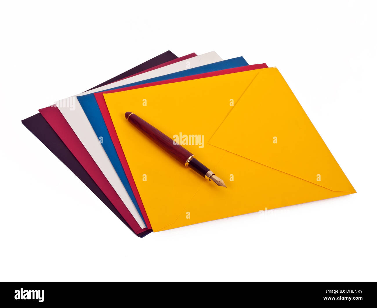 Penna stilografica e colorati avvolge isolati su sfondo bianco Foto Stock