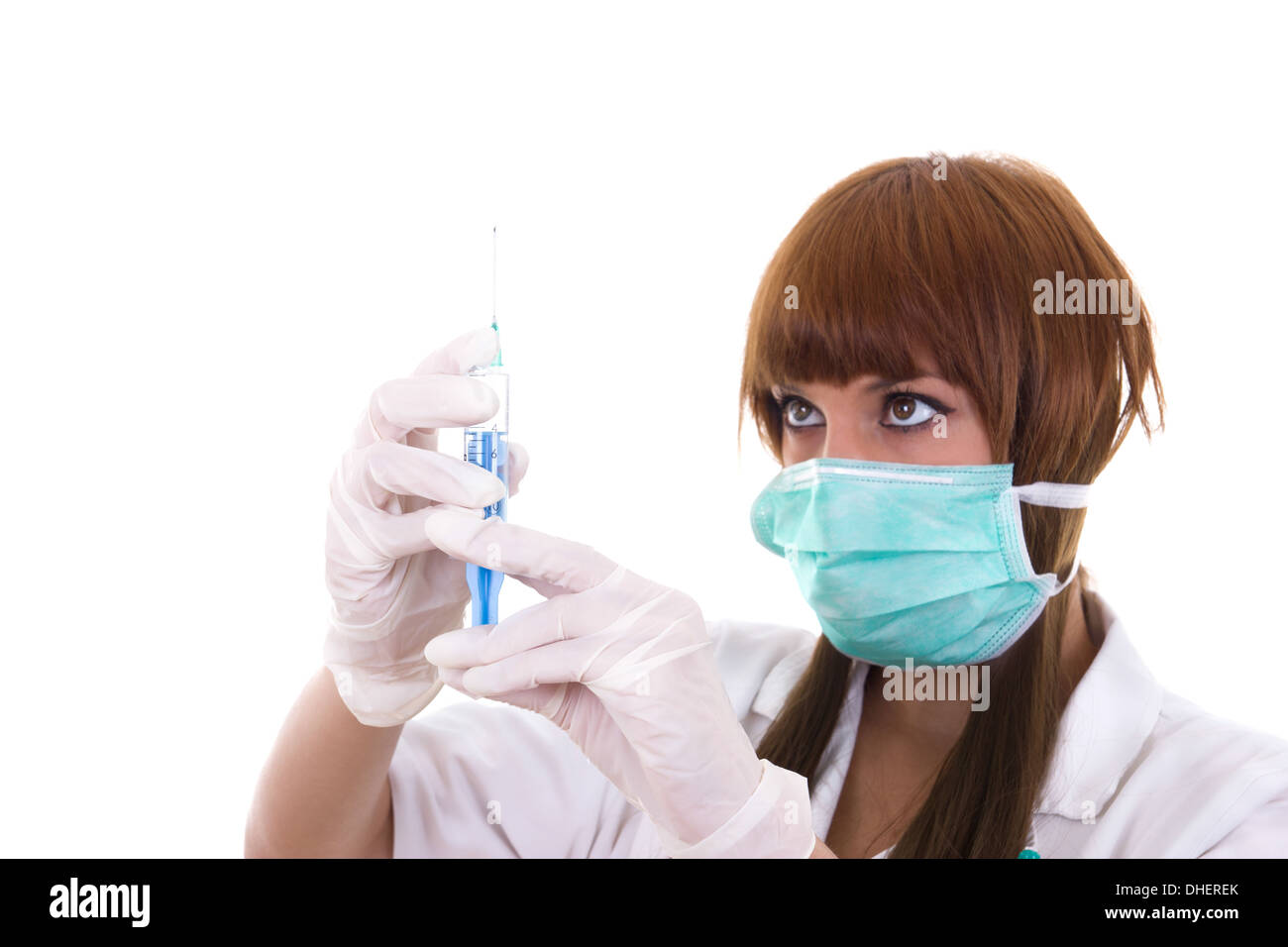 Infermiere medico con una siringa ed un ago in mani Foto Stock