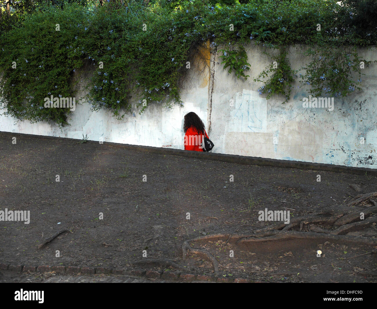 Donna rossa Foto Stock