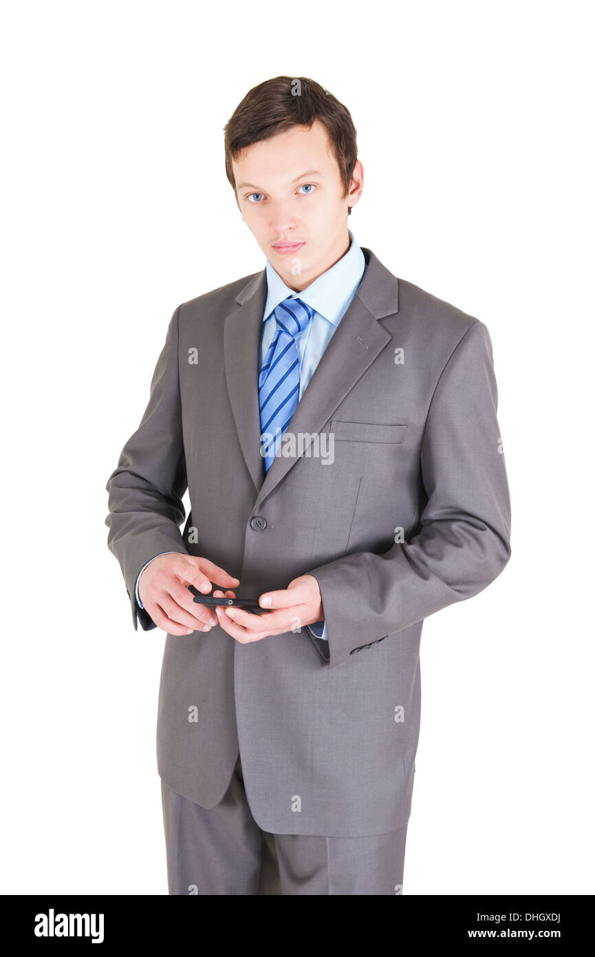 Giovane imprenditore con telefono cellulare isolato su sfondo bianco Foto Stock