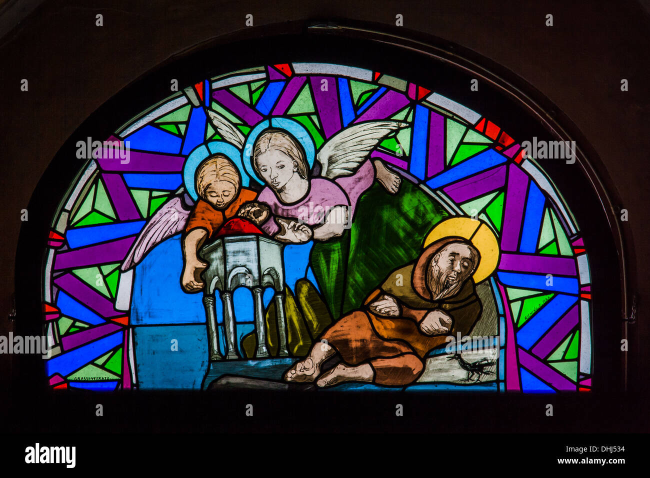 Angeli costruire un santuario per l'eremita in una vetrata di Santa Caterina,di reno, Italia Foto Stock