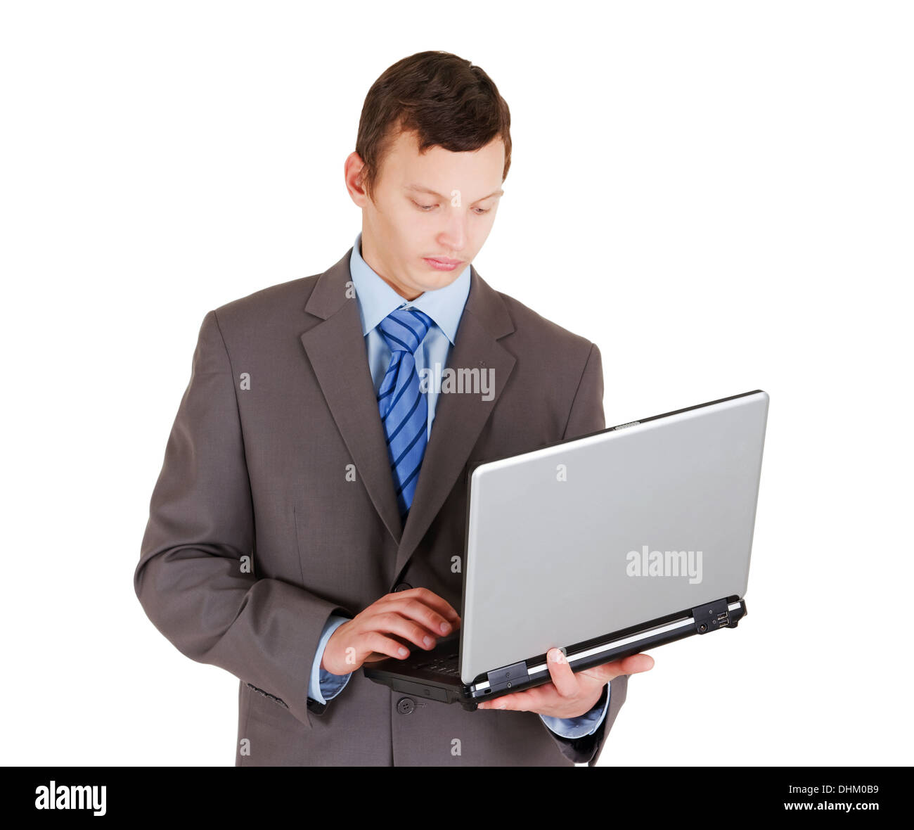 Giovane uomo d affari con computer portatile isolato su sfondo bianco Foto Stock