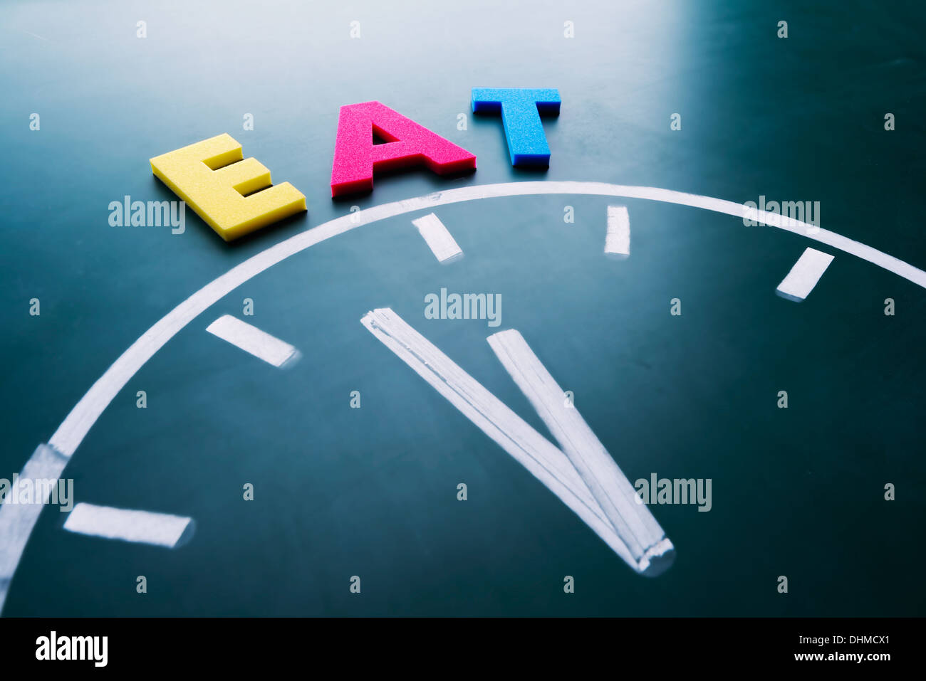 Il tempo di mangiare concept Foto Stock
