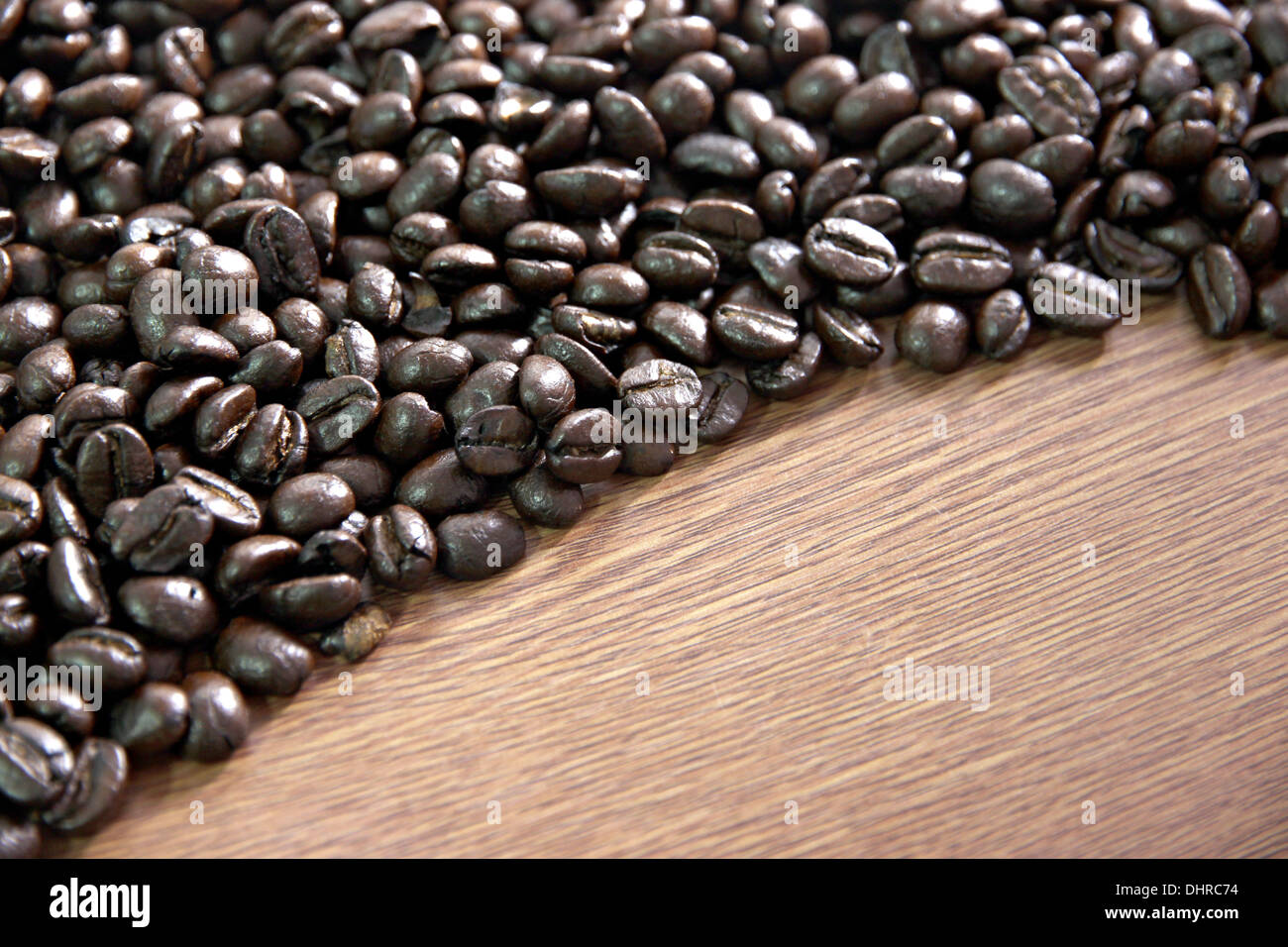 L'immagine i chicchi di caffè Rams sul vecchio sfondo di legno. Foto Stock
