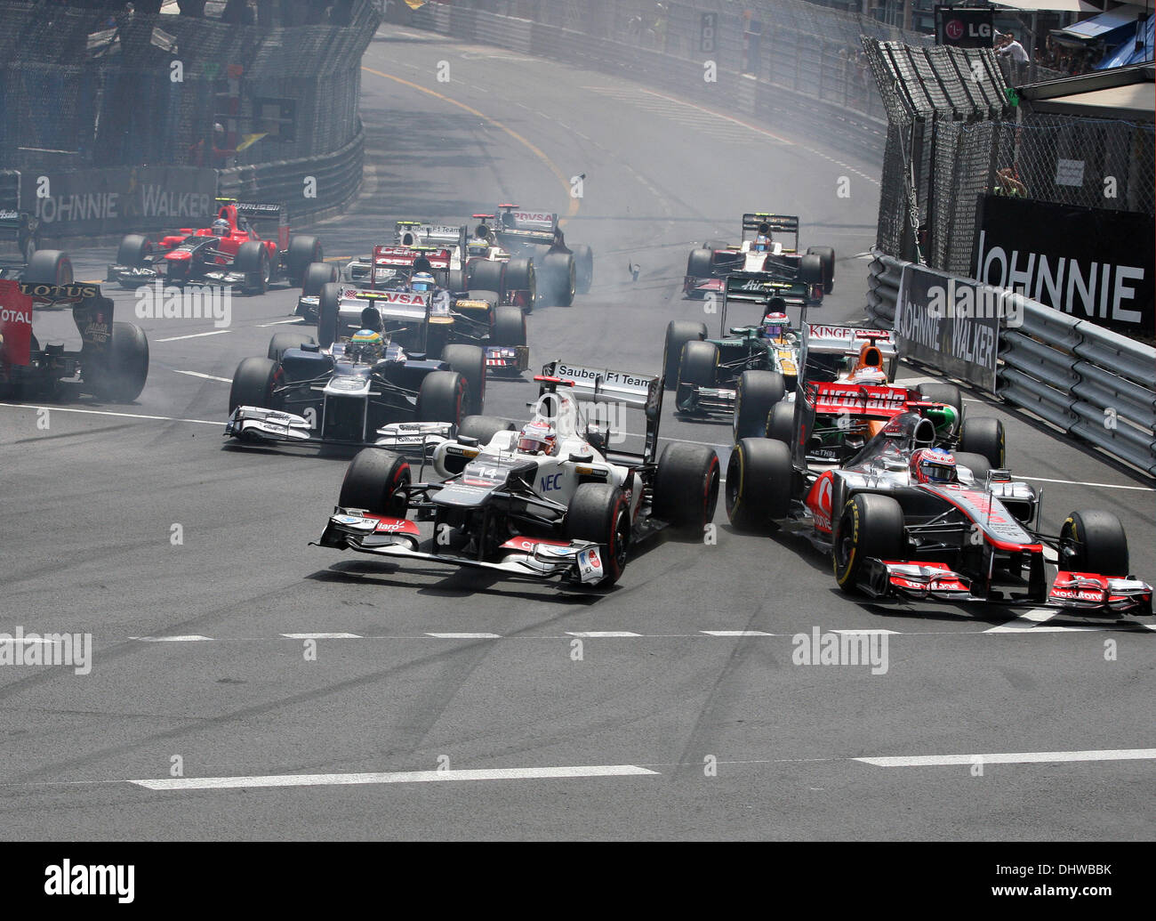 Avviare crash con Romain Grosjean nel team Lotus F1 dopo la collisione con Michael Schumacher la Mercedes di Formula Uno Stagione 2012 - F1 Grand Prix di Monaco - tenutosi presso il Circuito de Monaco - Gara Monte Carlo, Monaco - 27.05.12 Foto Stock