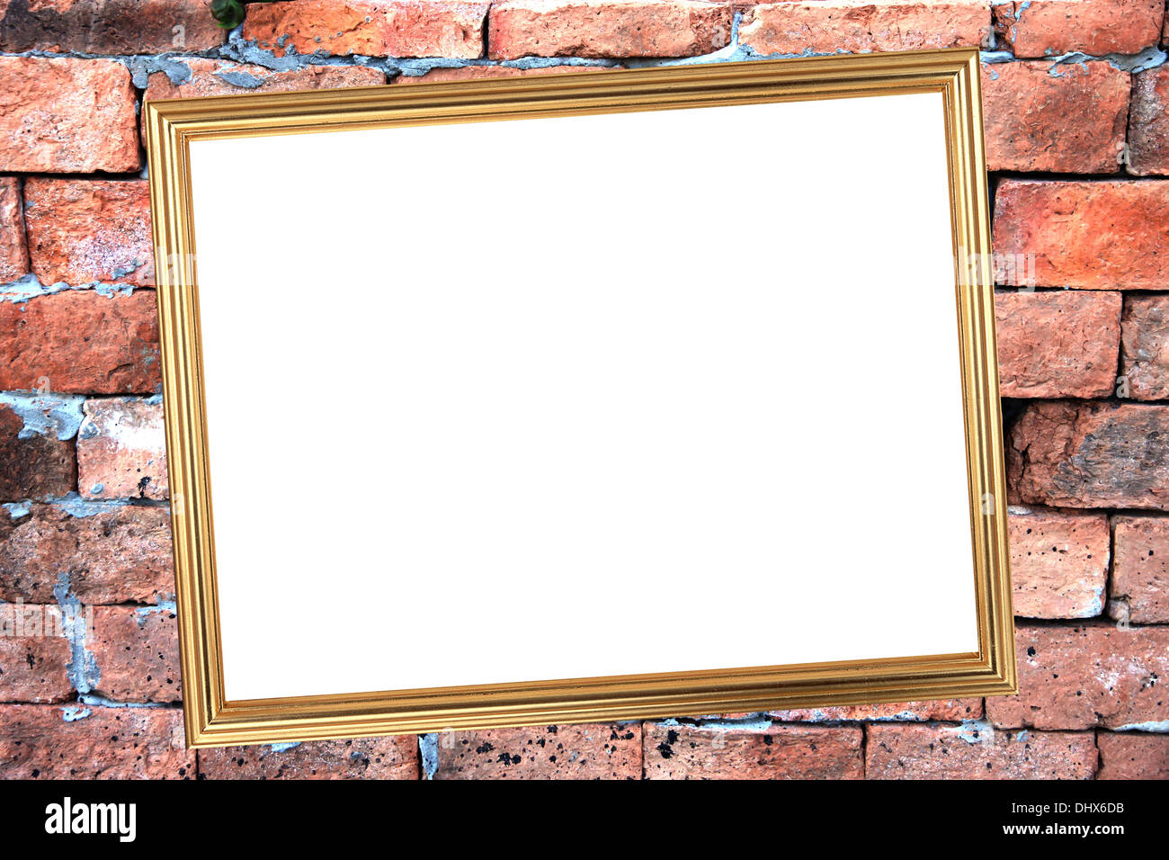 Il telaio in oro su sfondo di mattoni di pietra. Foto Stock