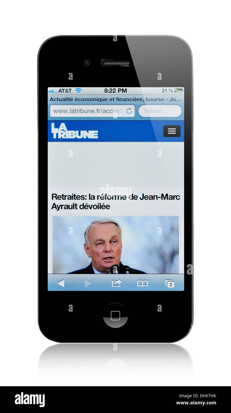 Lo schermo di iPhone che mostra la Tribune sito internet, un giornale finanziario francese Foto Stock