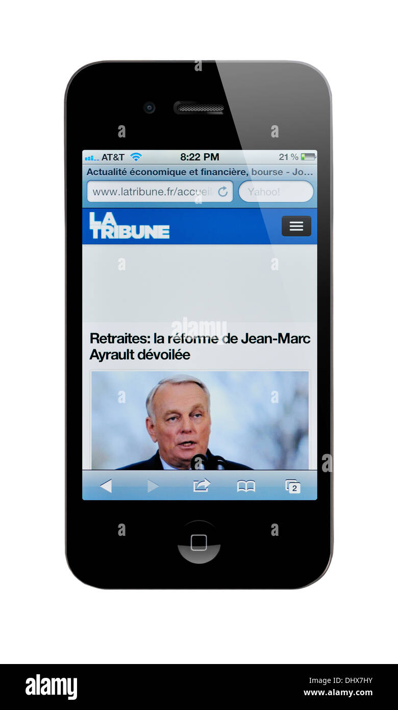 Lo schermo di iPhone che mostra la Tribune sito internet, un giornale finanziario francese Foto Stock