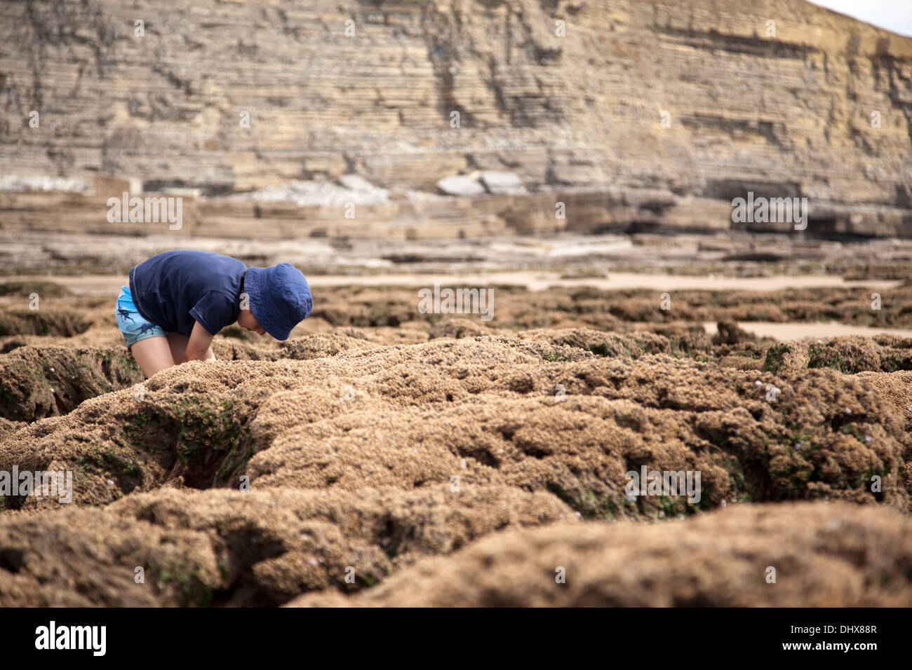 Ragazzo in mare, faggio Foto Stock