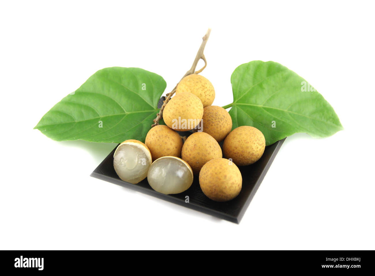 Close up longan nel piatto nero. Foto Stock