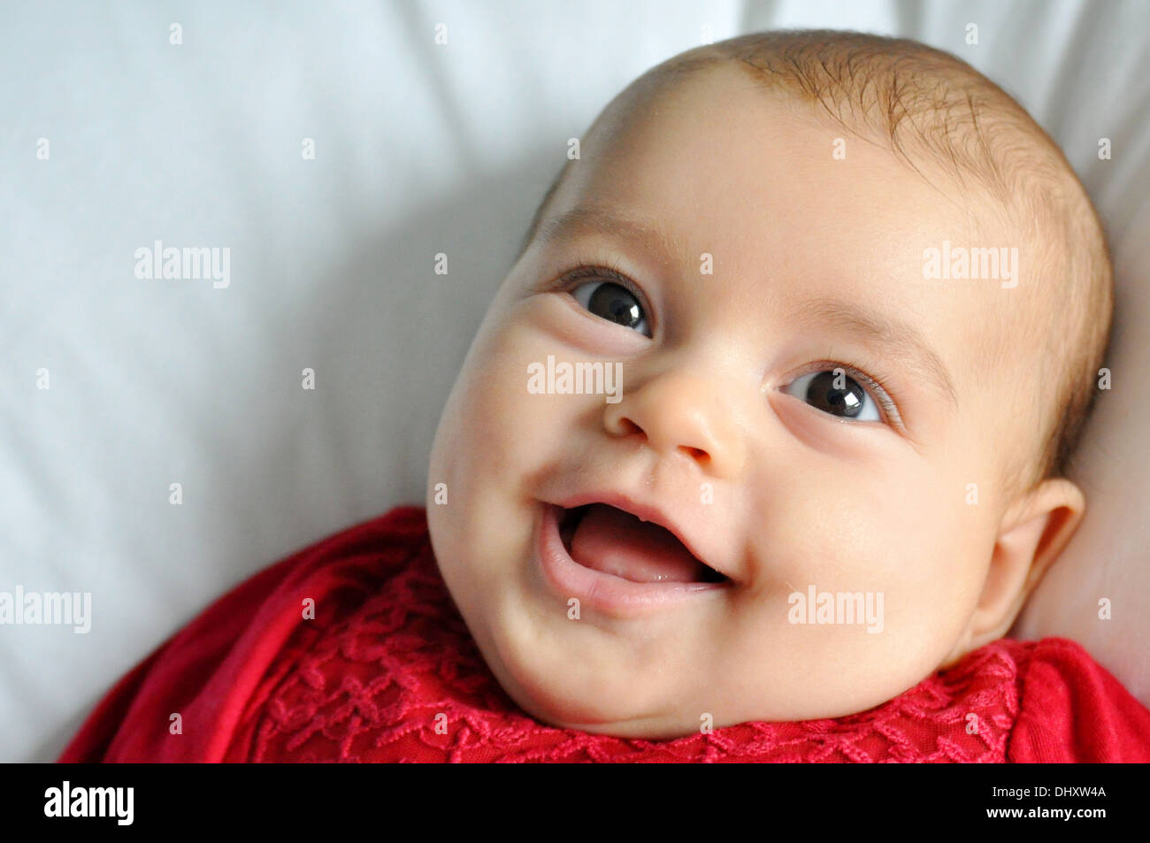 Baby ragazza sorridente e ridere Foto Stock