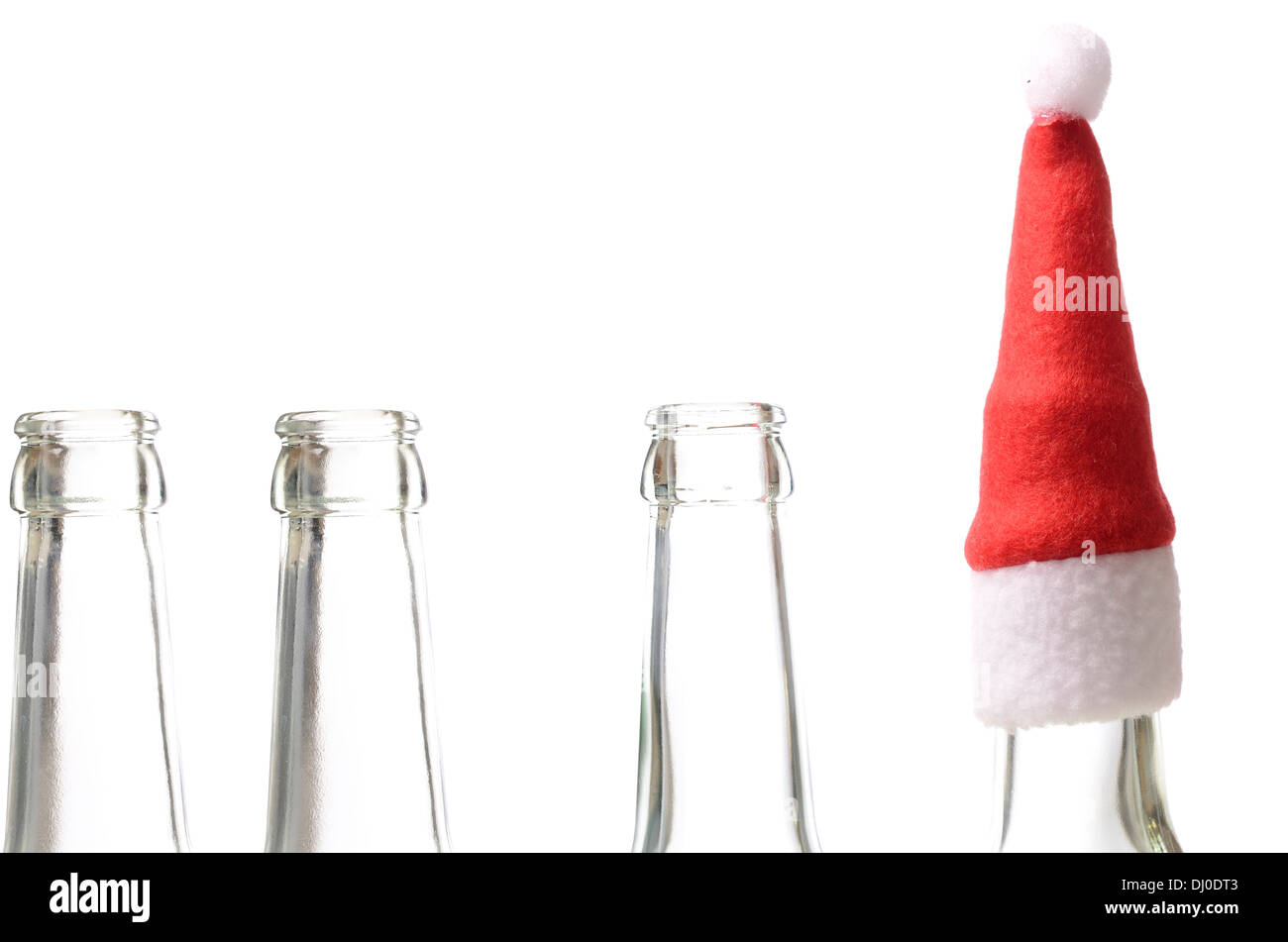 Bottiglie vuote con Santa's hat Foto Stock