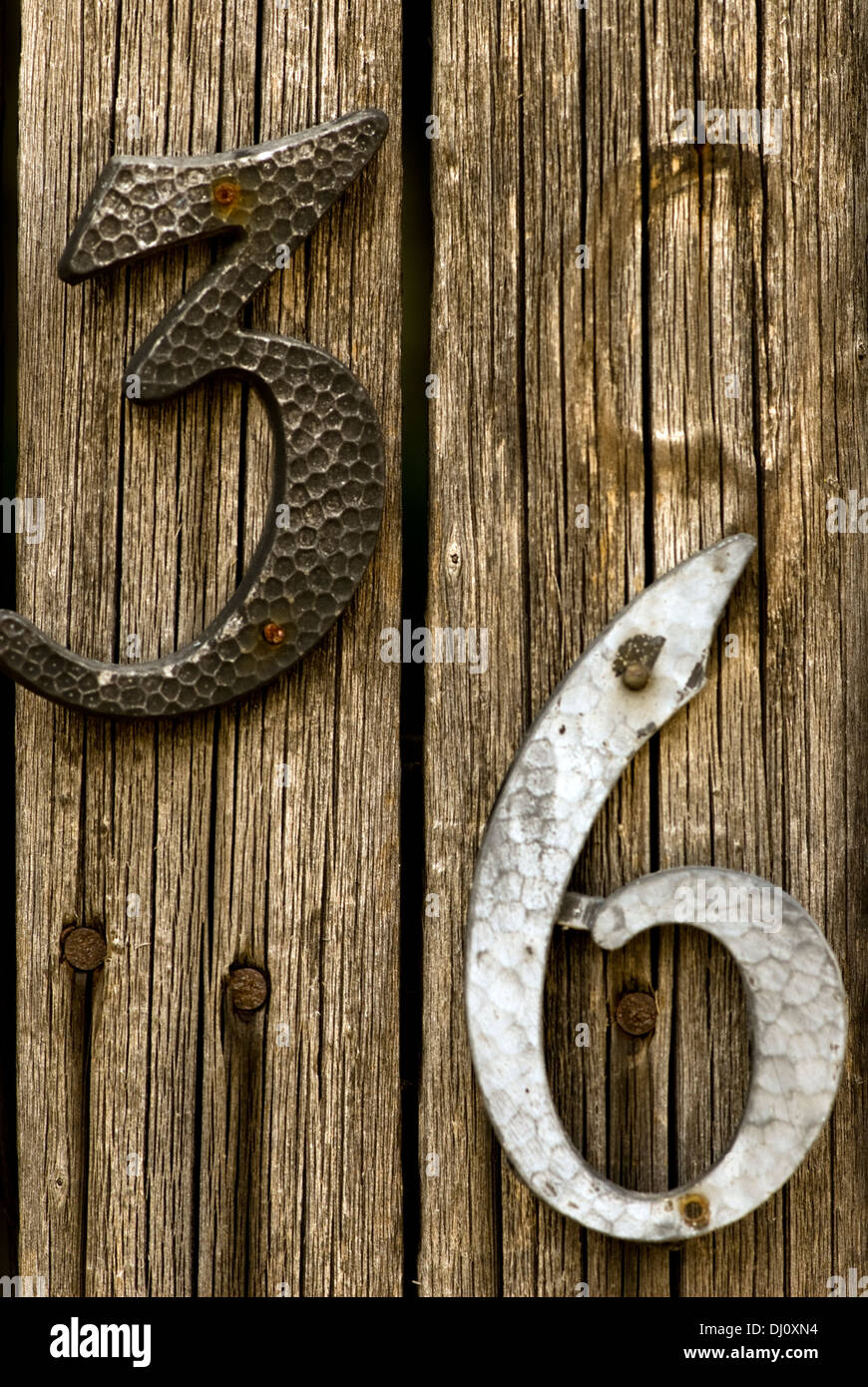 La numerazione è cambiato in un recinto. Foto Stock