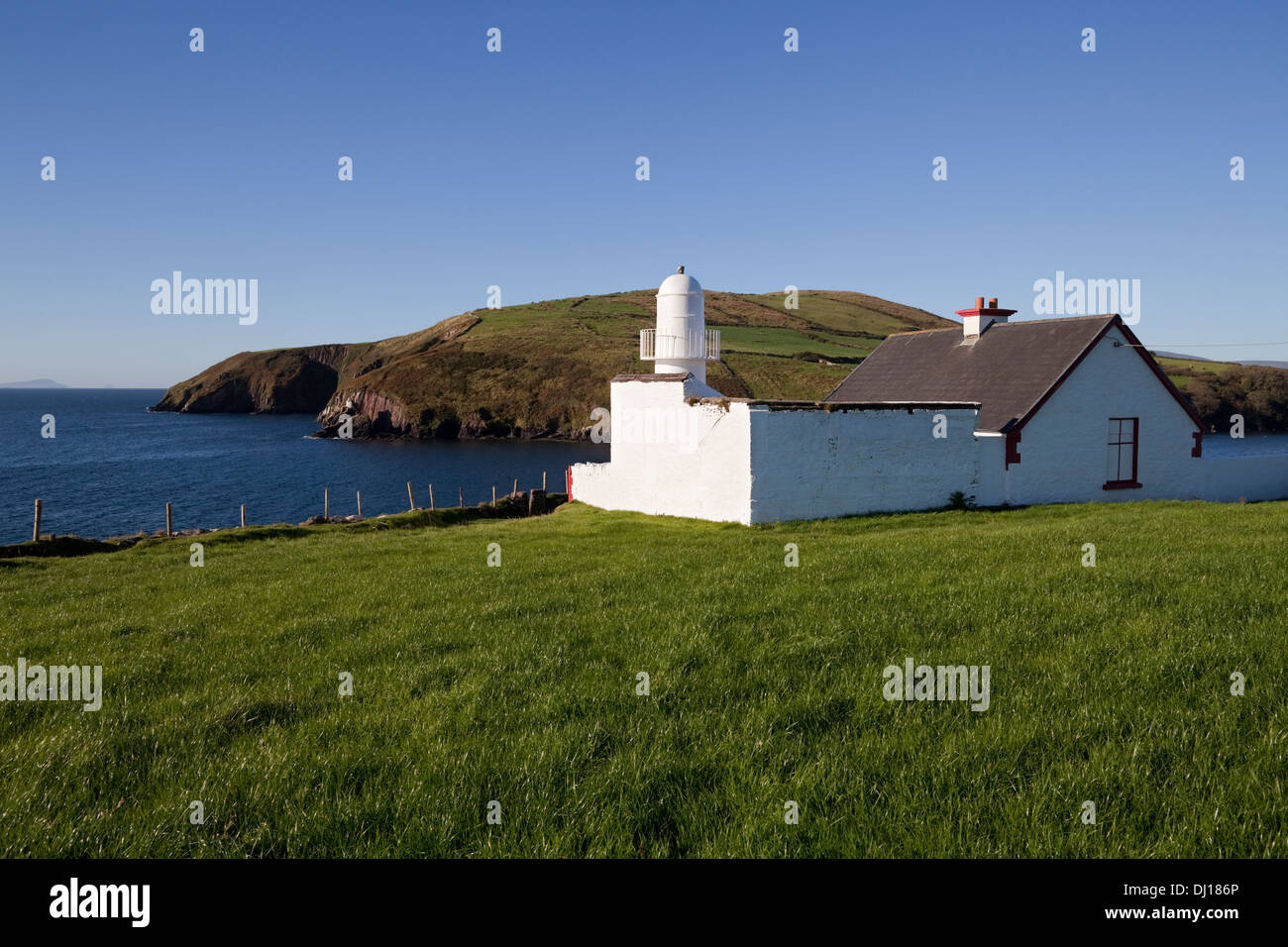 Faro all'ingresso al porto di Dingle, penisola di Dingle, nella contea di Kerry, Irlanda Foto Stock