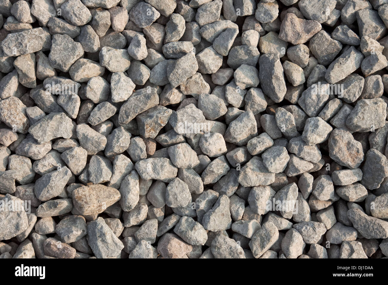 Texture di ghiaia dall'alto. Artificialmente ciottoli rotti sul terreno Foto Stock