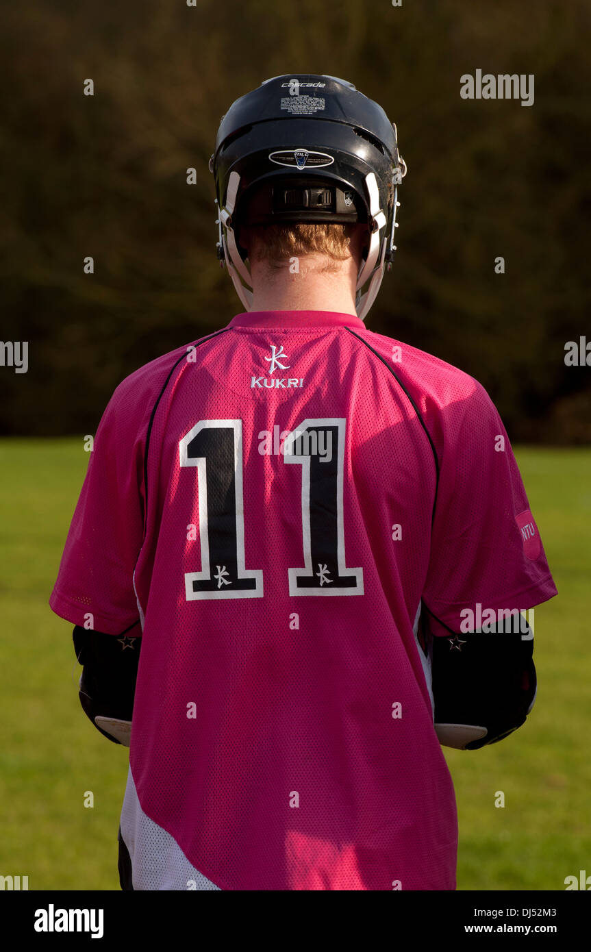 Università sport, uomini lacrosse player con il numero 11 una maglietta. Foto Stock