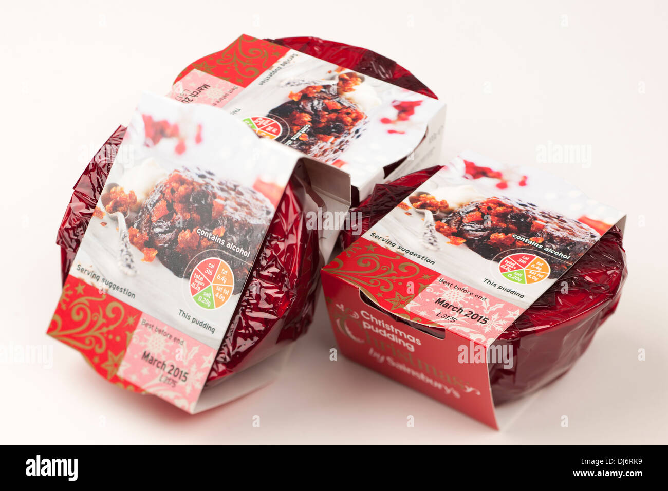 Tre singole porzione pudding di Natale da Sainsbury Foto Stock