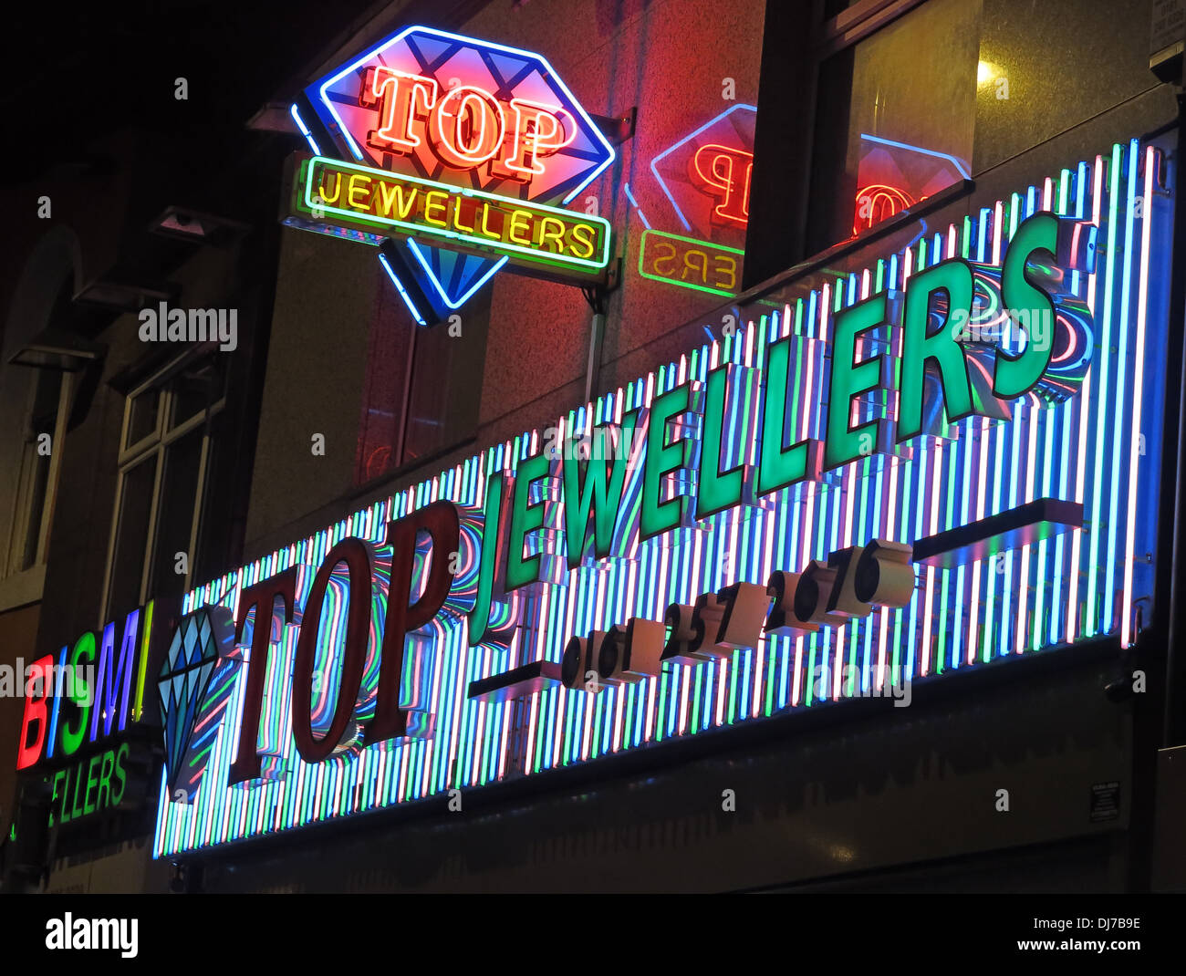 Top Indian gioiellieri Rusholme Curry Mile Manchester Inghilterra England Regno Unito di notte Foto Stock