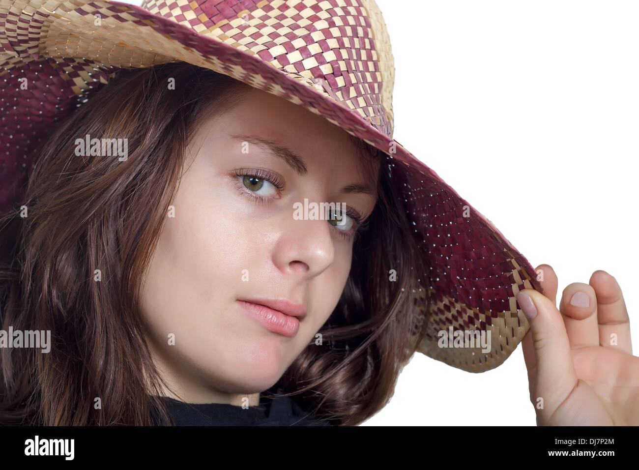 Ritratto di una donna bella in un cappello di paglia Foto Stock