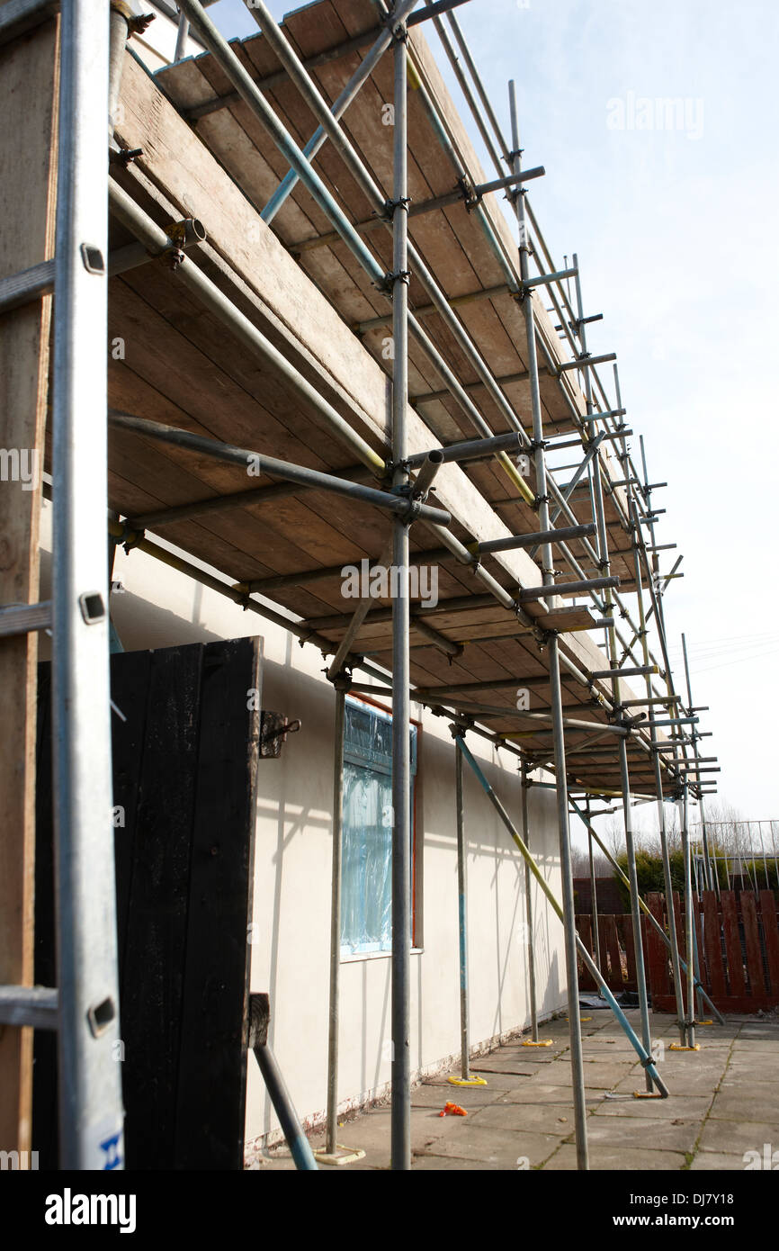 Una parete esterna sistema di isolamento EWI essendo installati come parte dei governi del Regno Unito Energia Obbligo della società ECO Foto Stock