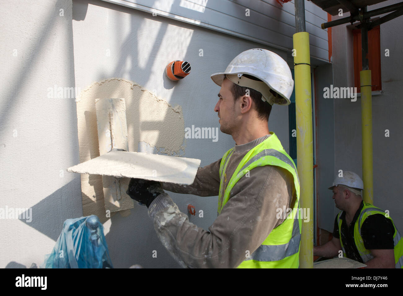 Il rendering di una parete esterna del sistema di isolamento EWI come parte dei governi del Regno Unito Energia Obbligo della società ECO Foto Stock