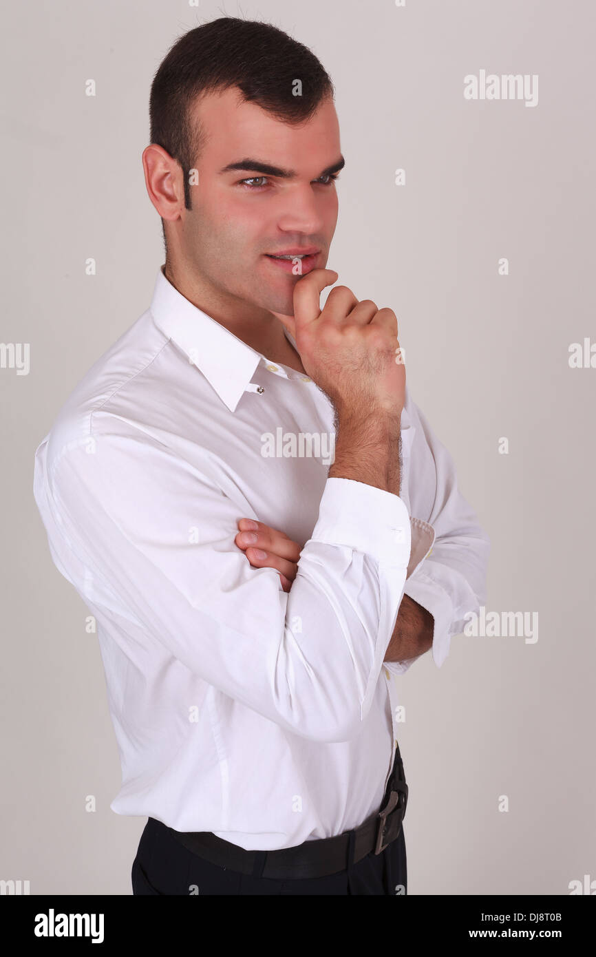 Bello riflessivo, elegante uomo Foto Stock