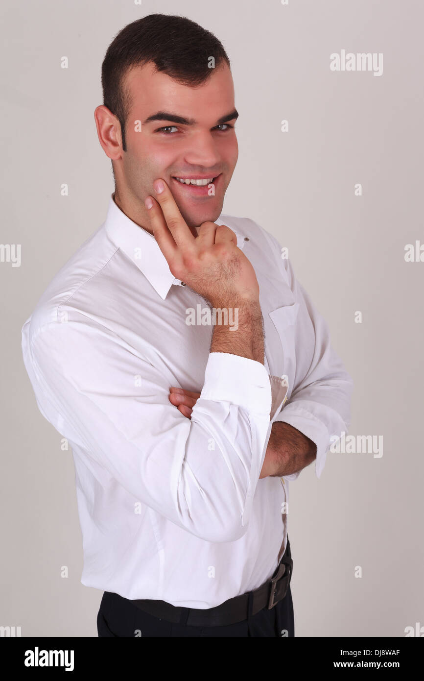 Bello riflessivo, elegante uomo Foto Stock