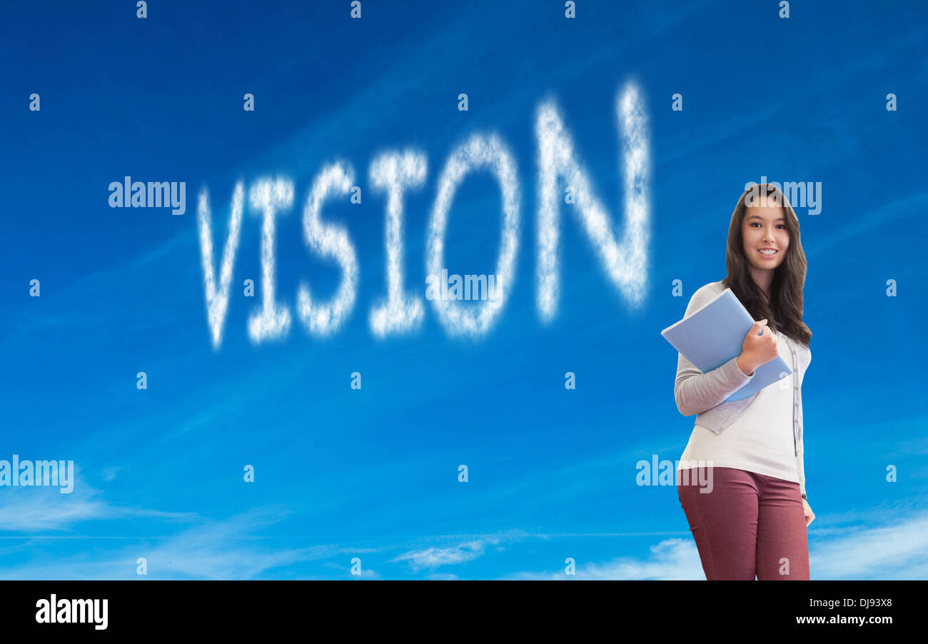 Immagine composita di sorridere studente in una sala computer Foto Stock