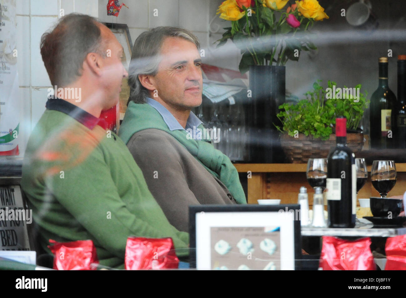 Manager del Manchester City Roberto Mancini e David Platt pranzo a Alderley Edge Manchester, Inghilterra - 20.09.12 Foto Stock