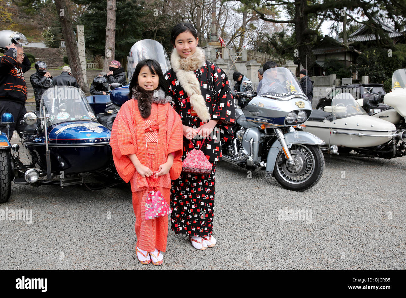 Un giovane giapponese garl con Harley Davidson sul display, Giappone Foto Stock