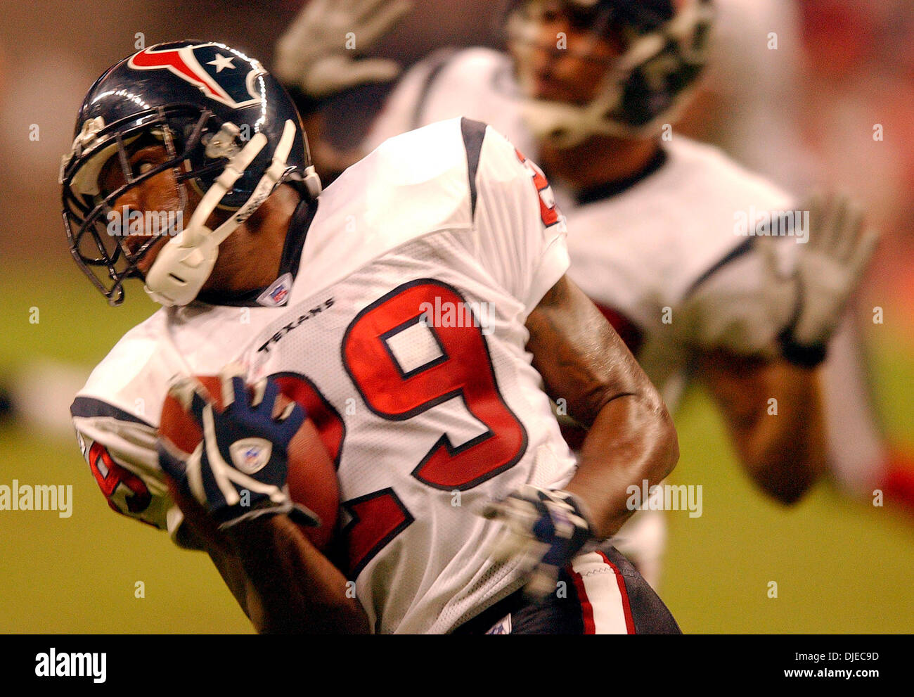 Agosto 14, 2004; Houston, TX, Stati Uniti d'America; Houston Texans #29 MARION MCCREE intercetta un Dallas Cowboys passano nei pressi della endzone nel terzo trimestre che si è concluso a Dallas drive al Reliant Stadium. Texans di Houston ha vinto contro Dallas Cowboys 18-0. Foto Stock