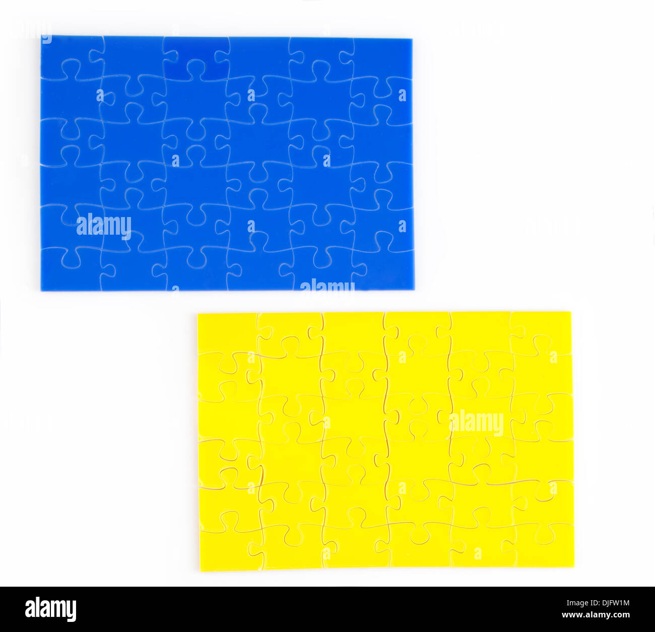 Giallo e blu di pezzo di puzzle insieme una completa Foto Stock