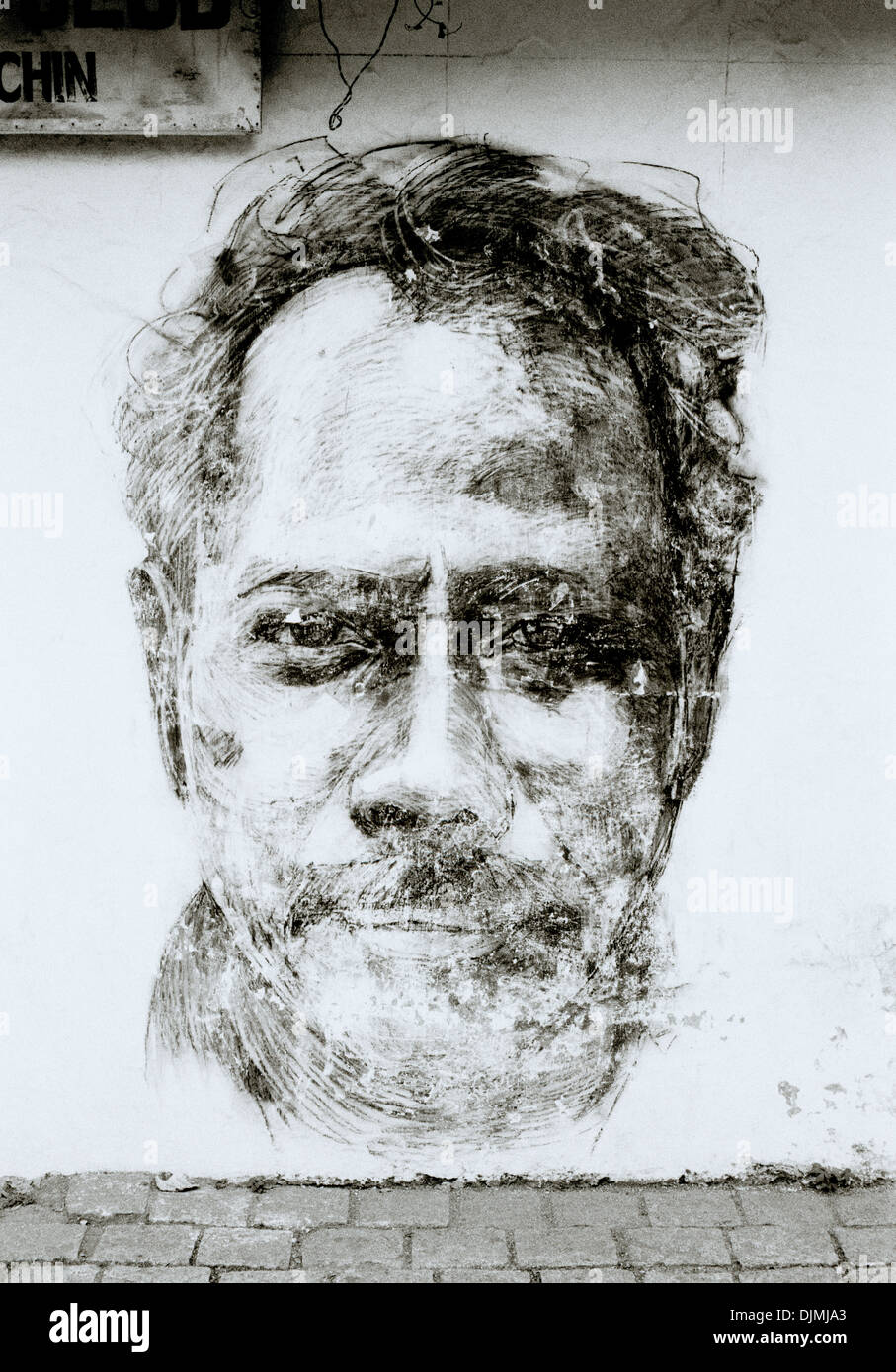 La street art di Fort Kochi Cochin in Kerala in India del Sud in Asia. Urban Graffiti ritratto grafico ritrattistica immagine Reportage di Viaggio Foto Stock