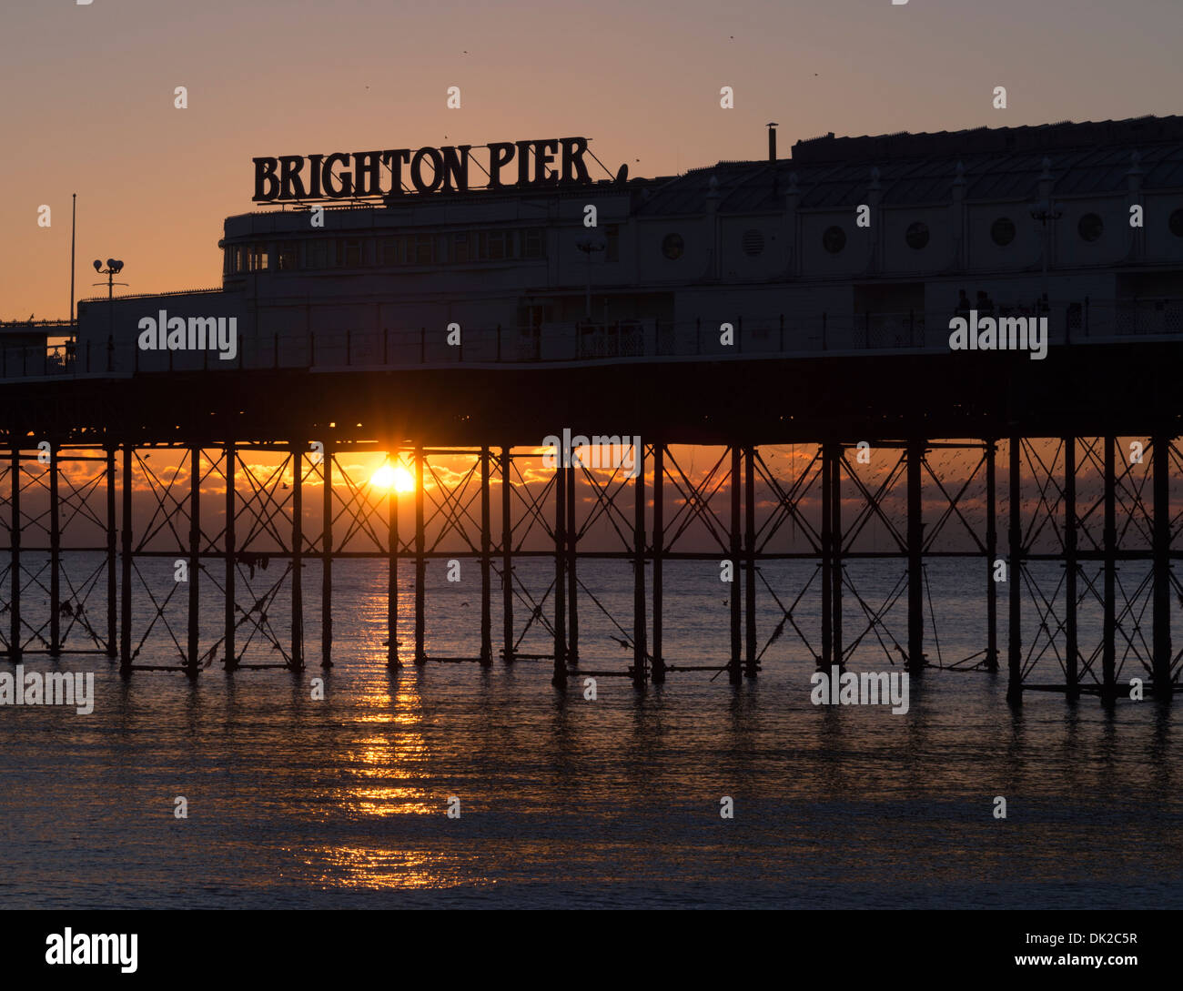 Il Brighton Pier tramonto, Sussex, Inghilterra Foto Stock