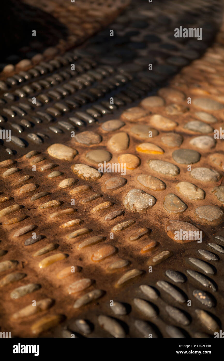 Full frame close up stone massaggio ai piedi il percorso Foto Stock