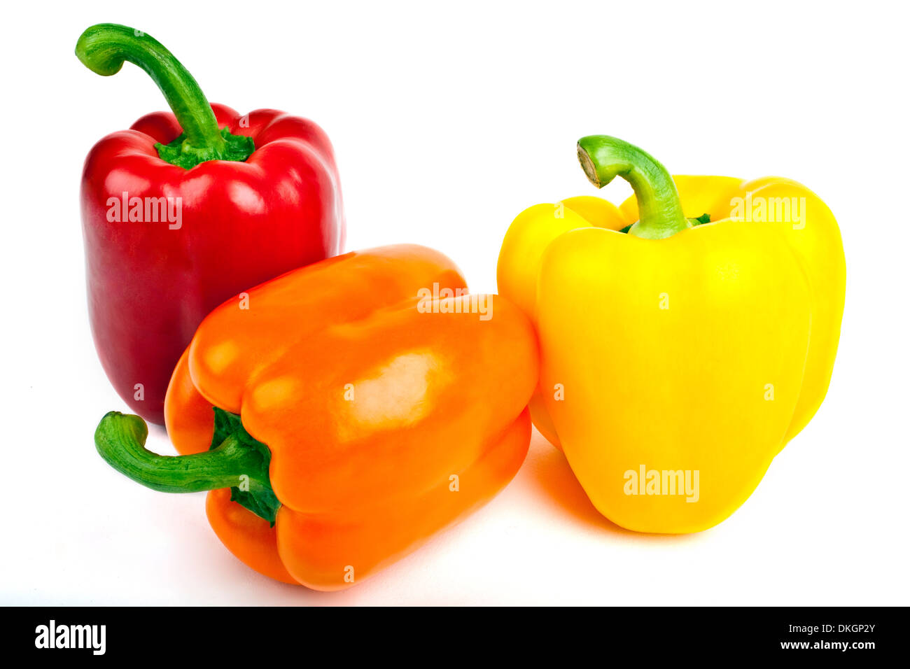 Tre i peperoni su uno sfondo bianco. Foto Stock