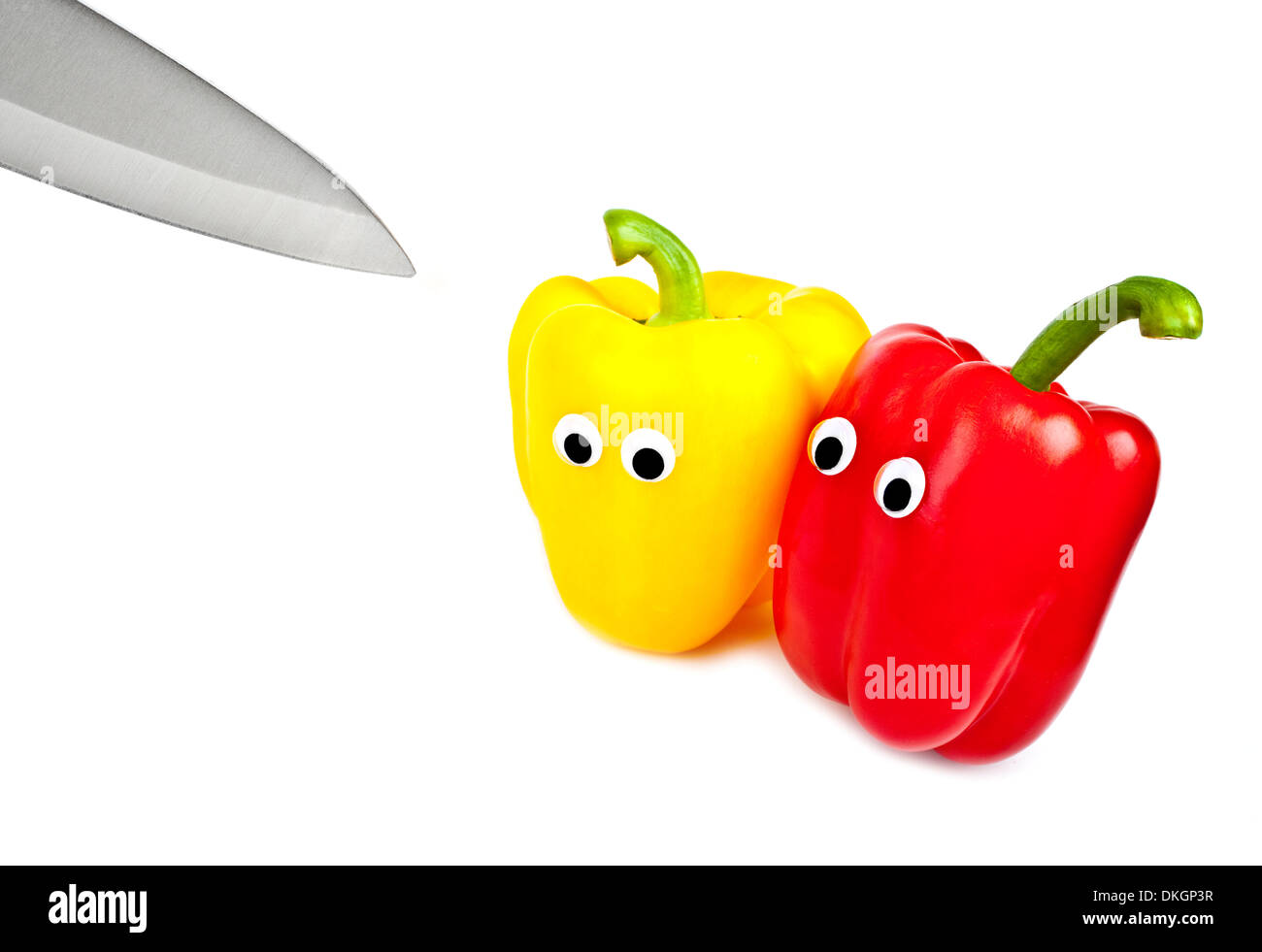 Sistema nervoso guardando i peperoni in procinto di essere tagliate in pezzi. Foto Stock