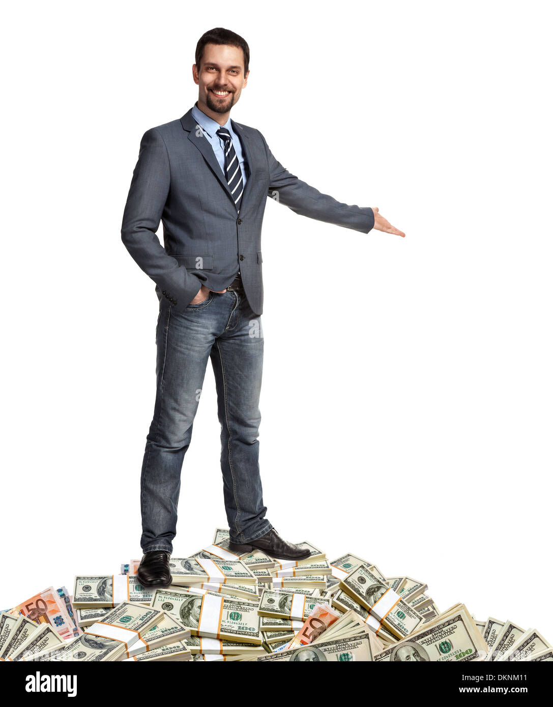 Happy businessman mostra il modo di fare un sacco di soldi Foto Stock