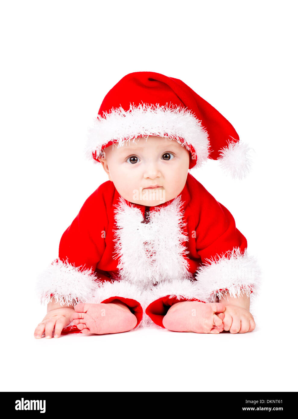 Natale bambino in Santa Claus vestiti Foto Stock