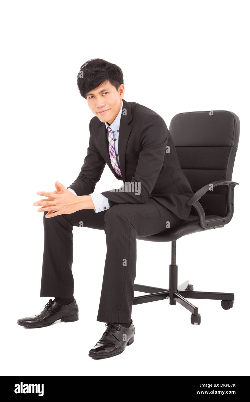 Giovane imprenditore smart seduto in una sedia Foto Stock