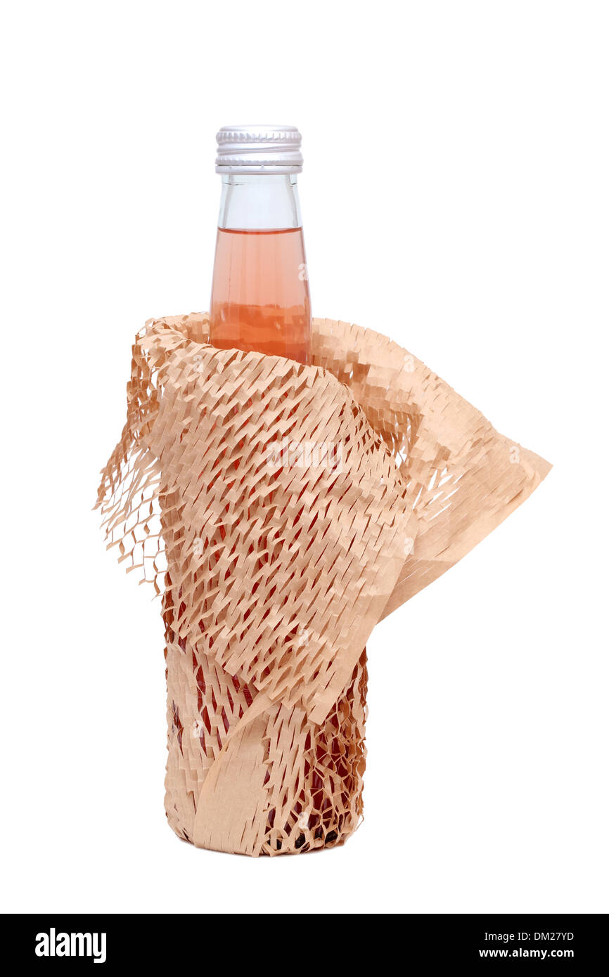 Bottiglia di succo di frutta con carta da imballaggio Foto Stock