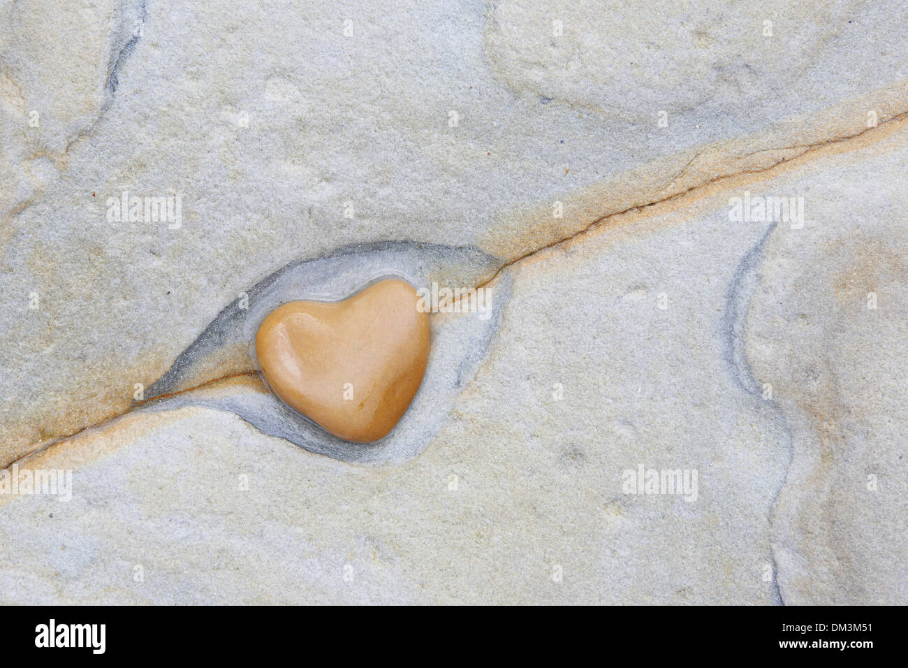 Dettaglio dettaglio Inghilterra roccia Gran Bretagna Europa cuore cuore forma costa di sfondo pattern Northumberland Valentino di pietra Foto Stock