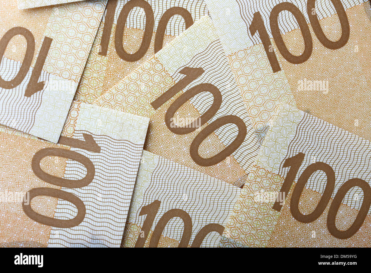 Nuovo di un centinaio di dollari sullo sfondo Foto Stock