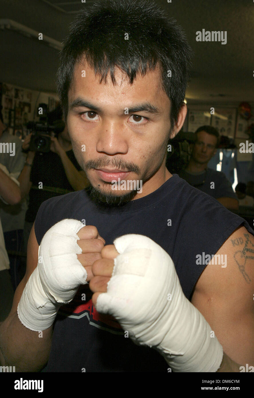 Mar 08, 2005; Hollywood, CA, Stati Uniti d'America; Phillipino superstar boxer MANNY "PACMAN' PACQUIAO treni per la WBO 12-round super piuma campionato contro Erik 'El terribile" Morales (Messico) a MGM Grand sabato 19 marzo. PACQUIAO viene addestrato dal leggendario boxing trainer Freddie Roach presso il carattere jolly Boxing Club. Foto Stock