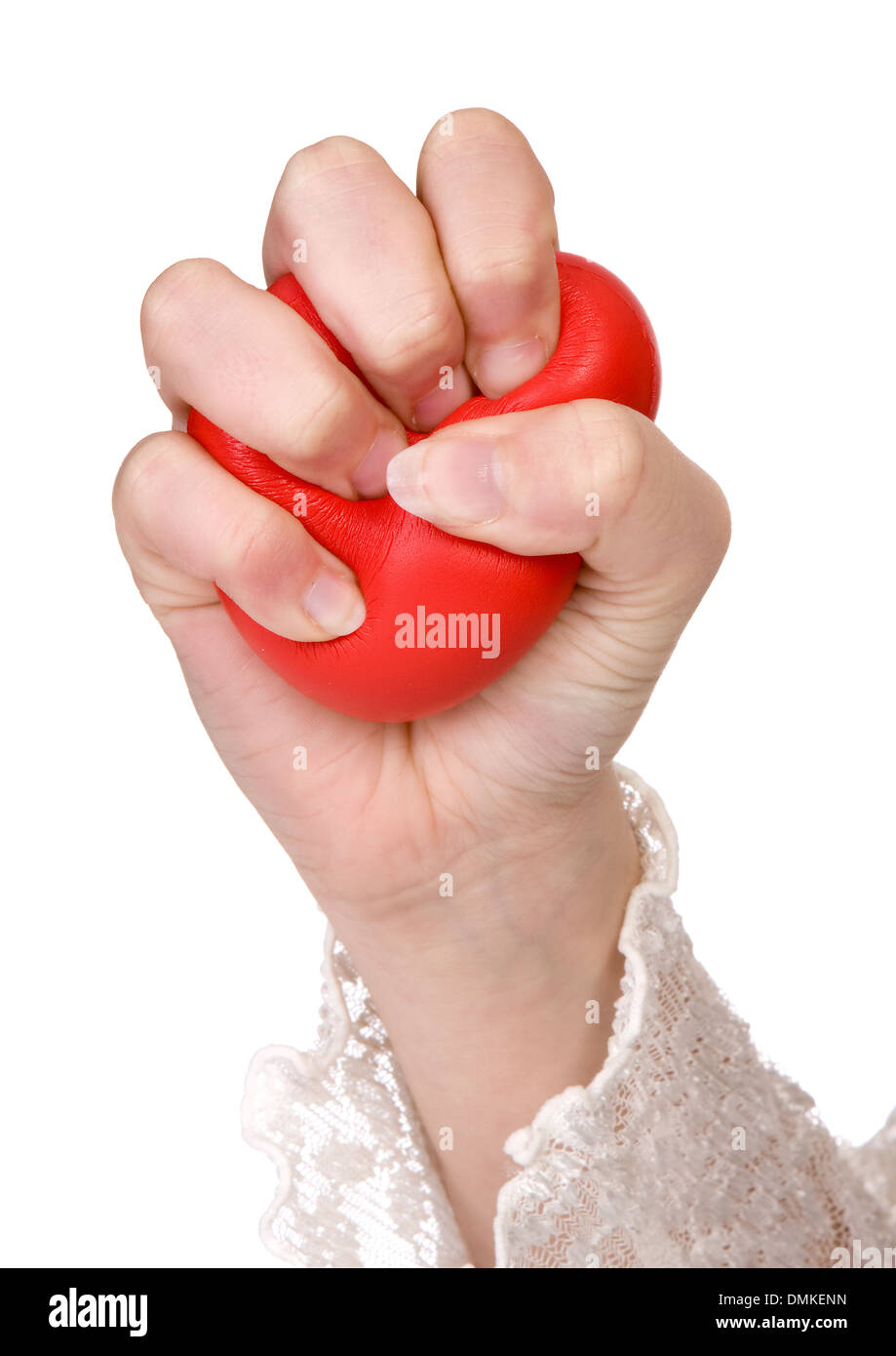Le mani di una donna la spremitura di una palla Foto Stock