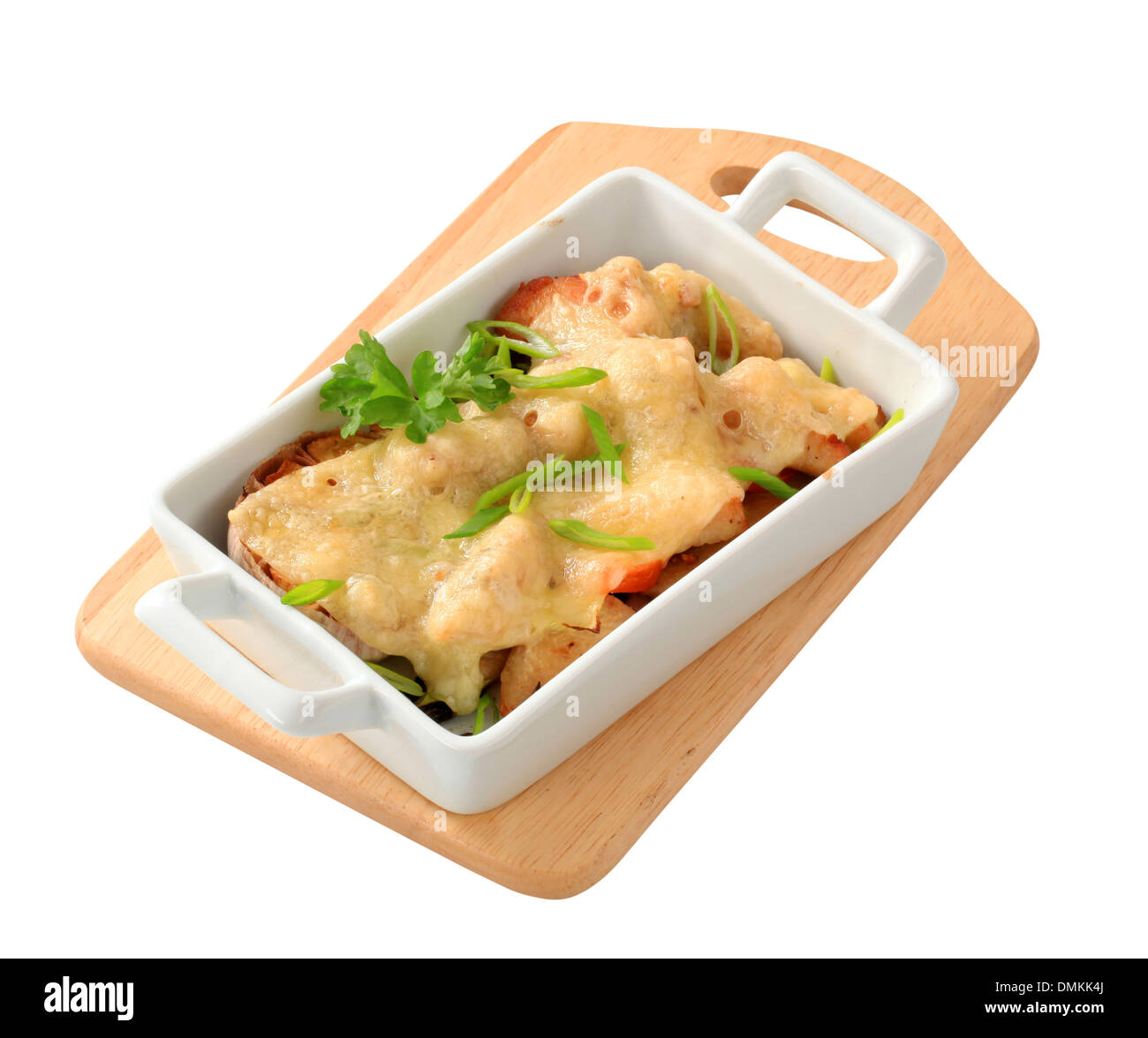 Arrosto di pollo a pezzi e aglio e rabboccato con formaggio Foto Stock