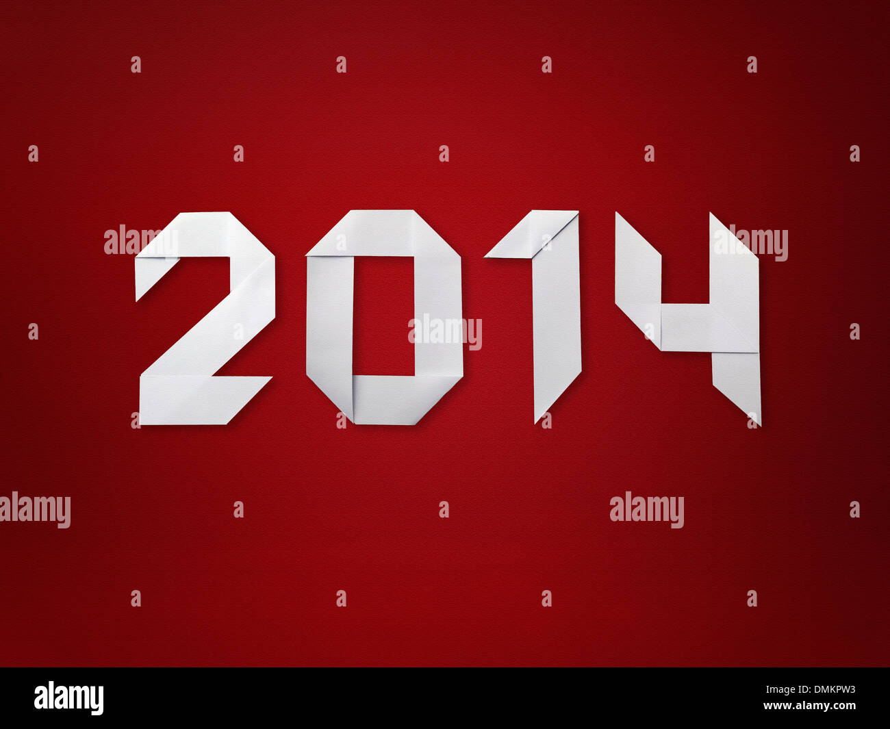 Anno Nuovo 2014 cifre piegato da carta in stile origami su sfondo rosso Foto Stock