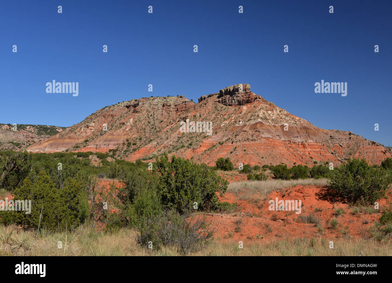 Terra rossa e le montagne in Palo Duro Canyon State Park nei pressi di Amarillo in Texas il Panhandle Foto Stock