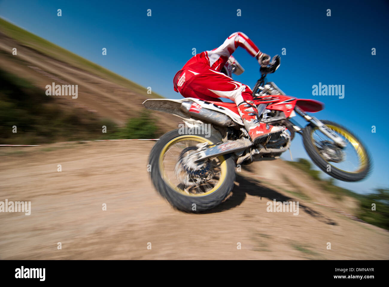 Il pilota di Motocross su una pista Foto Stock